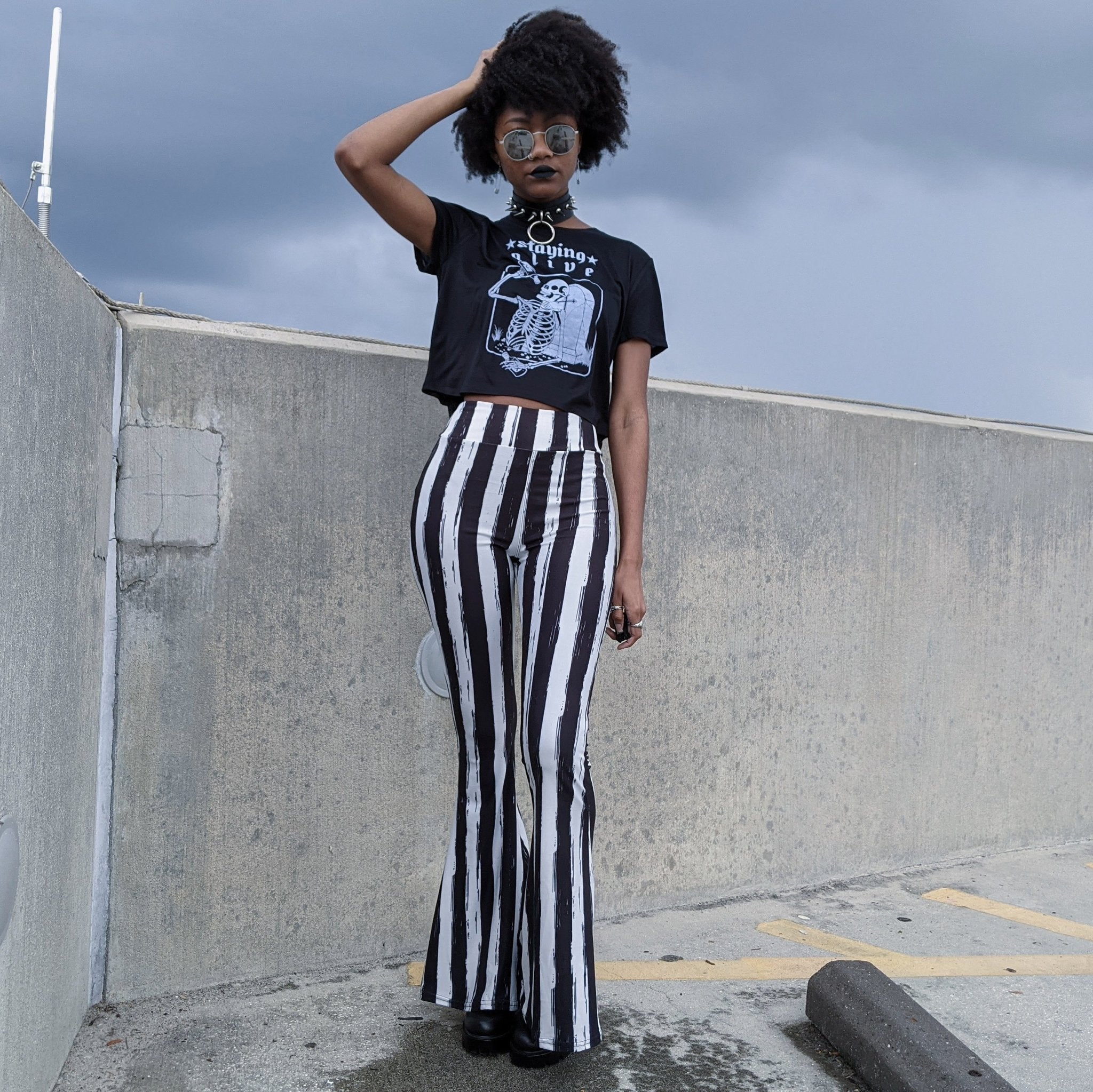 Black and white store striped bell bottom pants